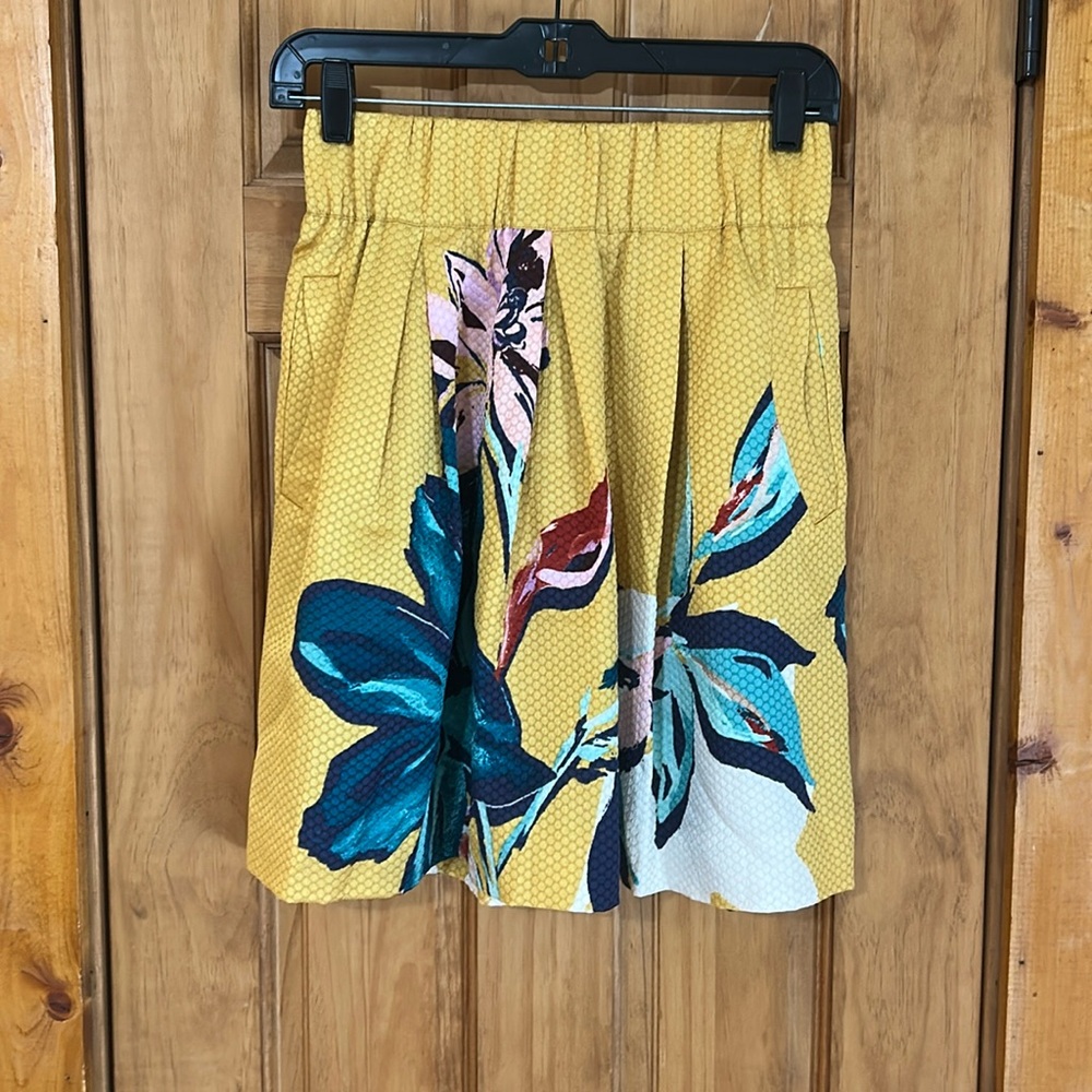 Maeve skirt. Mini, gold,blue, white. Spec of dark red, some lavender. Size 2.